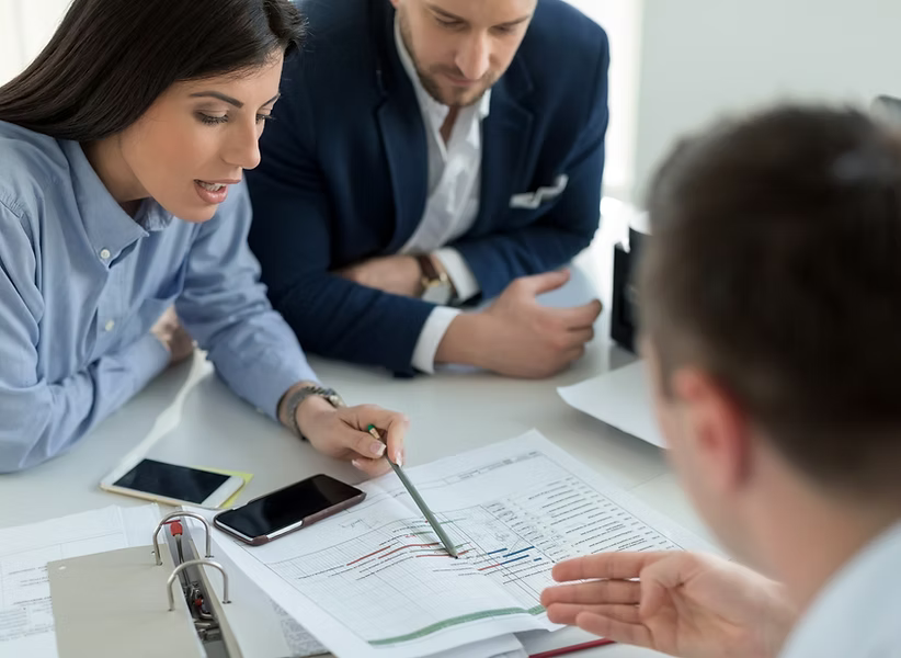 A couple at a business meeting